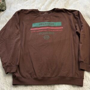 Young and reckless crewneck sweatshirt